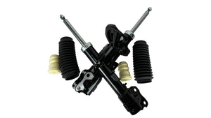 Automotive suspension components on a white background