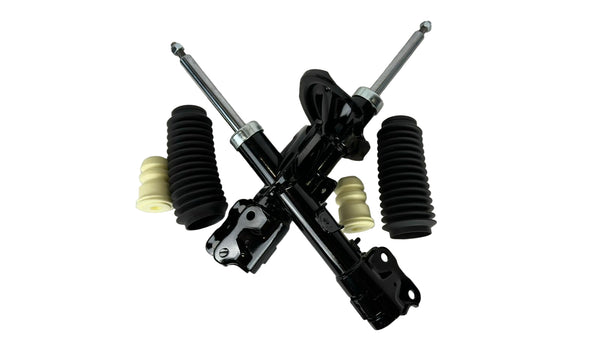 Automotive suspension components on a white background