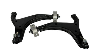 Two car suspension control arms on a white background