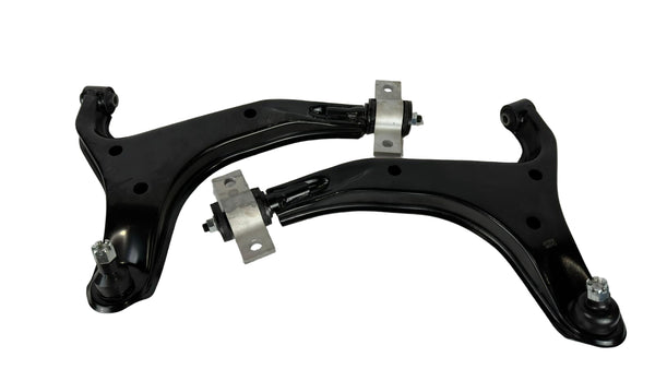 Two car suspension control arms on a white background