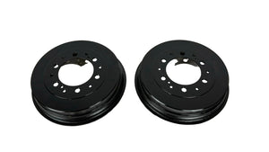 Two black brake rotors on a white background